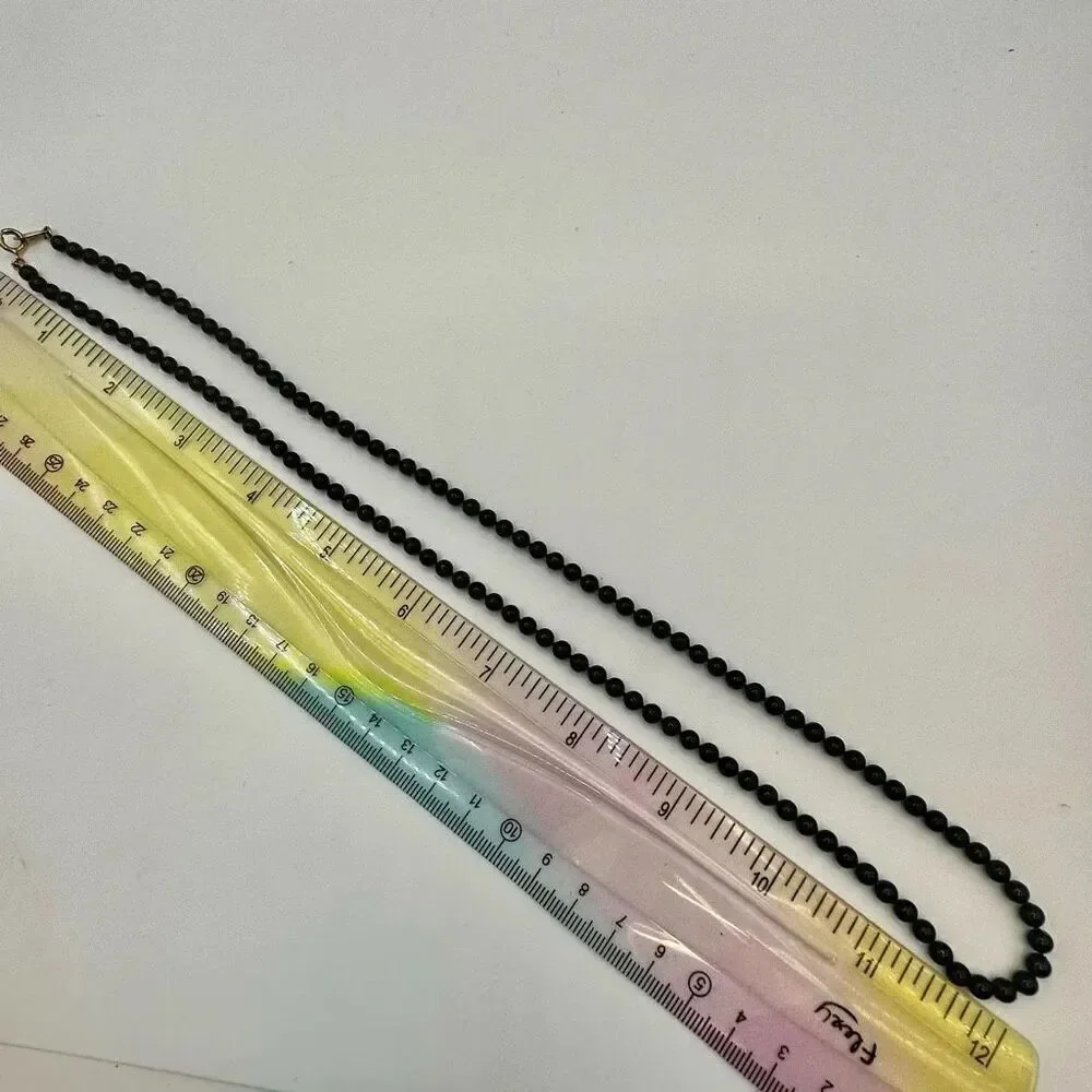 Oops a Daisy black beaded long necklace